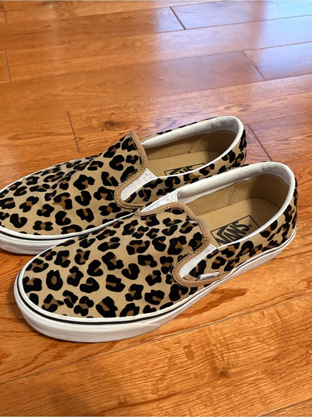 Vans Woman’s Slip-On Sneakers in Leopard Print Tan and Black